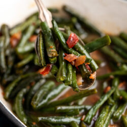 These Arkansas Green Beans are bathed in a rich glaze that perfectly balances sweet and savory with brown sugar, soy sauce, and garlic. Experience how this simple side dish is transformed into a delectable comfort food.