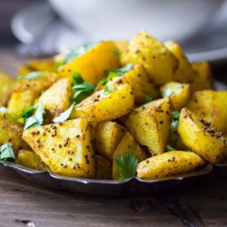 Bombay potatoes served on a plate.
