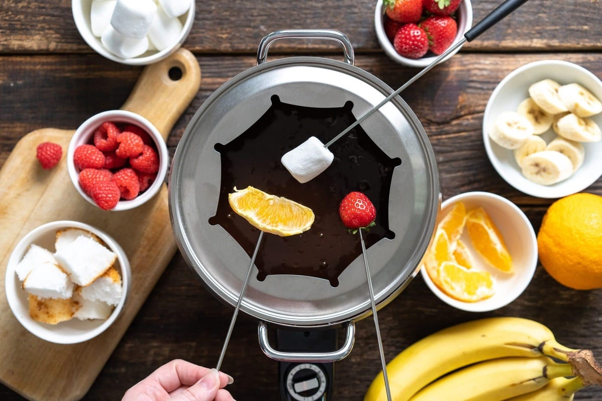 Dippable of marshmallow, strawberry, and orange for our milk chocolate fondue.