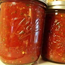 Homemade freezer salsa in a Mason jar.