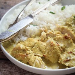 Indonesian chicken curry on a plate.