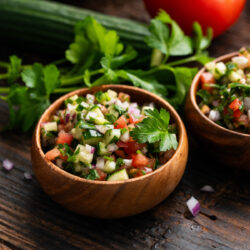 This Jerusalem Salad recipe is flavor-packed and uses the simplest ingredients that create a light fresh dish that comes together in a matter of minutes.