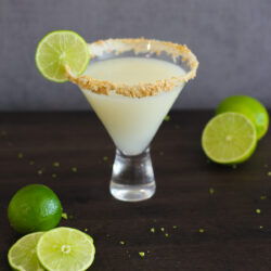 Enjoy dessert in a cocktail glass with this Key Lime Pie Martini! It's a creamy and citrusy drink that captures all your favorite flavors of the classic Key Lime Pie!