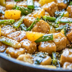 Sesame orange tofu in a skillet.