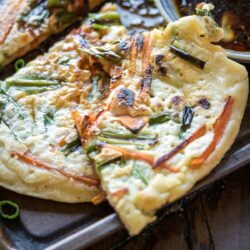Pajeon Korean pancakes on a tray.