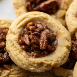 These Pecan Pie Cookies capture the the rich, buttery flavor of the classic pecan pie in a chewy cookie topped with gooey and flavorful pecans.