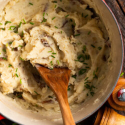 These Red Skin Mashed Potatoes are fluffy, creamy, and sure to be a favorite whether you're serving them with dinner for your family or at a holiday gathering!