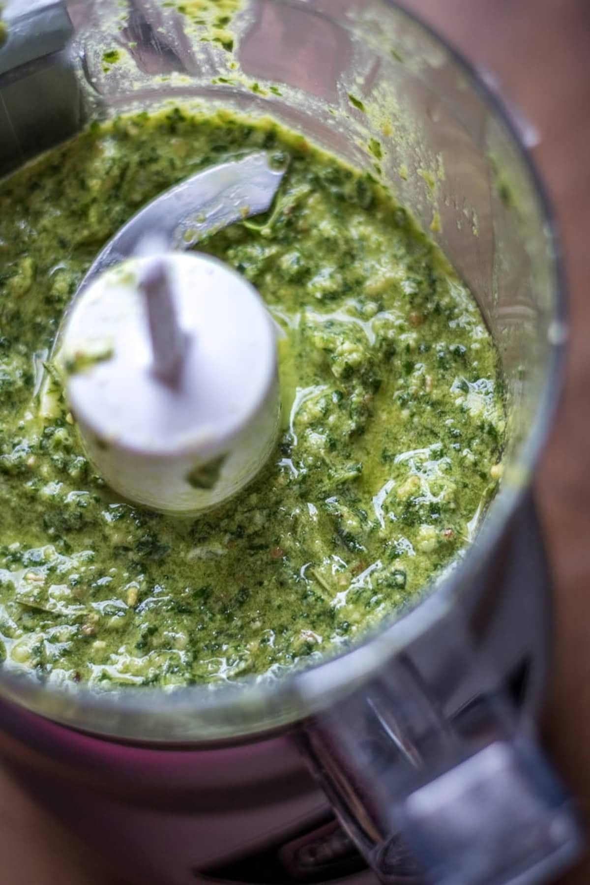 Pulsing the ingredients until they are coarsely combined.