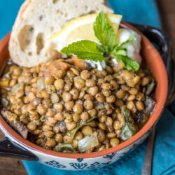 A bowl of Moroccan Lentils garnished with fresh cilantro.