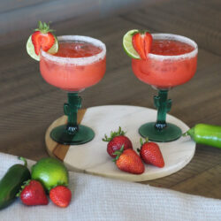 Two glasses of strawberry jalapeno margarita.