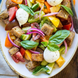 Easy panzanella salad on a white platter.