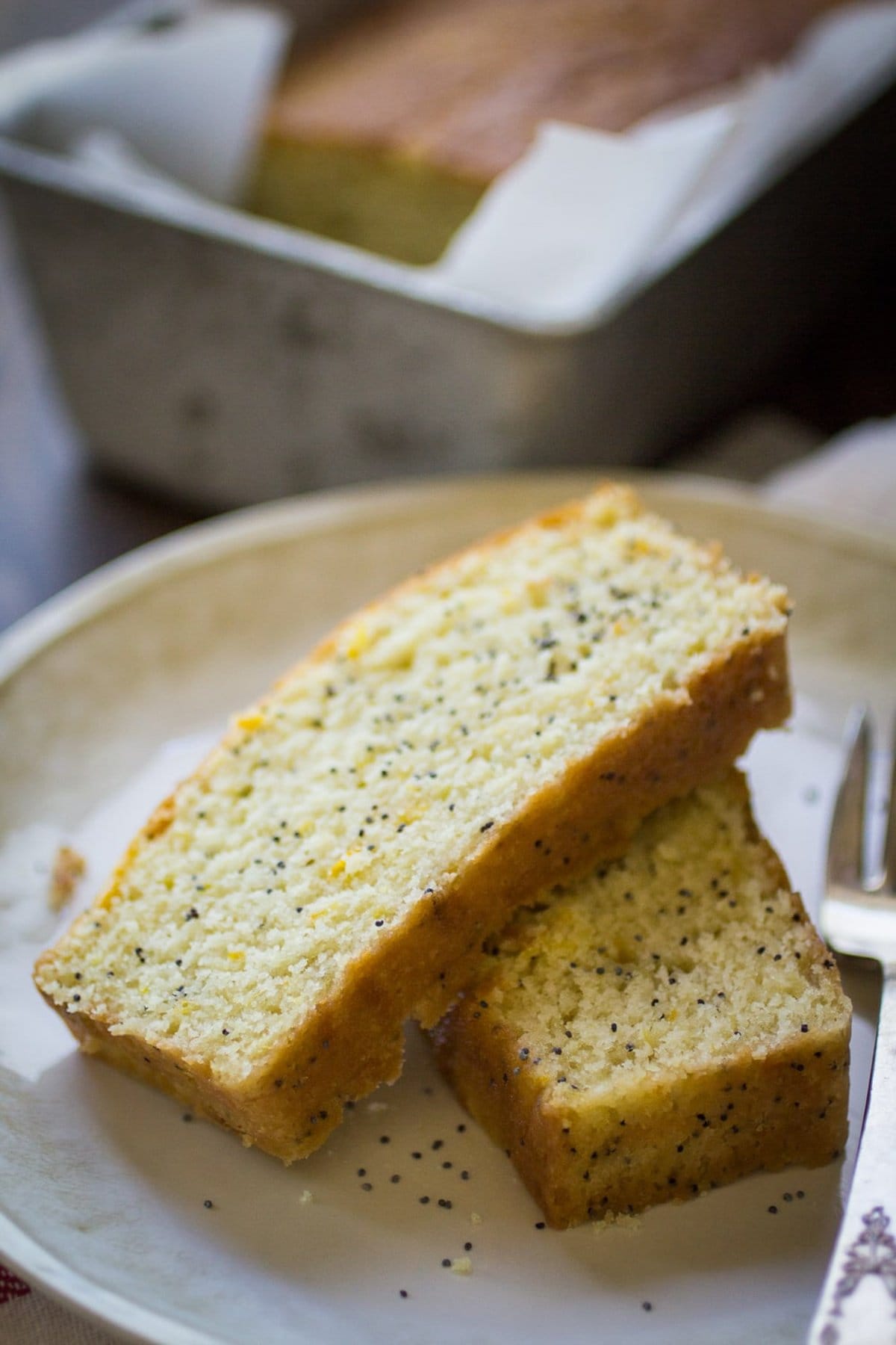 Summer Squash Bread slices on a white plate.